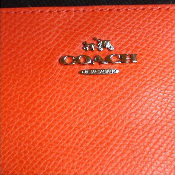 Coach Handbags - COACH WRISTLET Orange 6"X 4"  Pebble Leather / Tag / Mini Type